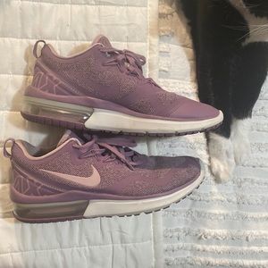 Purple Nike shoes